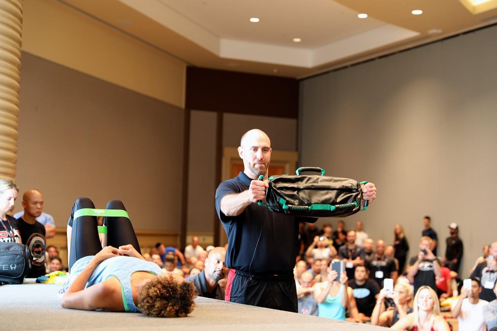 DVRT coaches demonstrating functional training at live workshops
