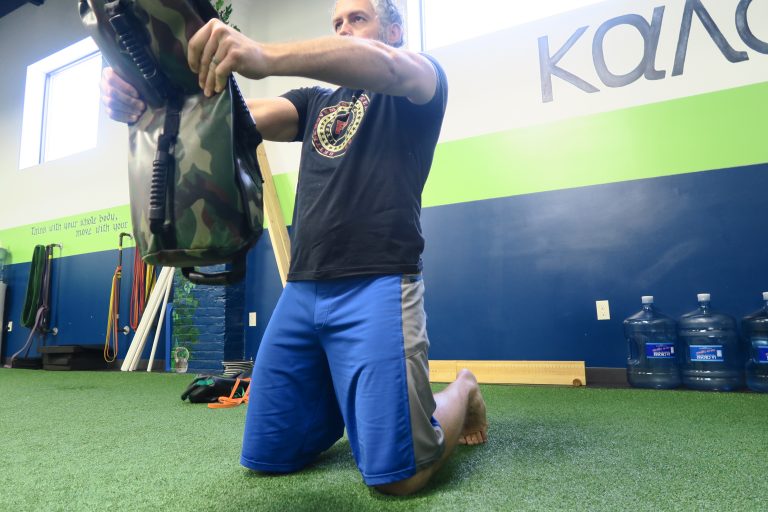 Get A Iron Grip with Ultimate Sandbag Exercises Ultimate Sandbag Training