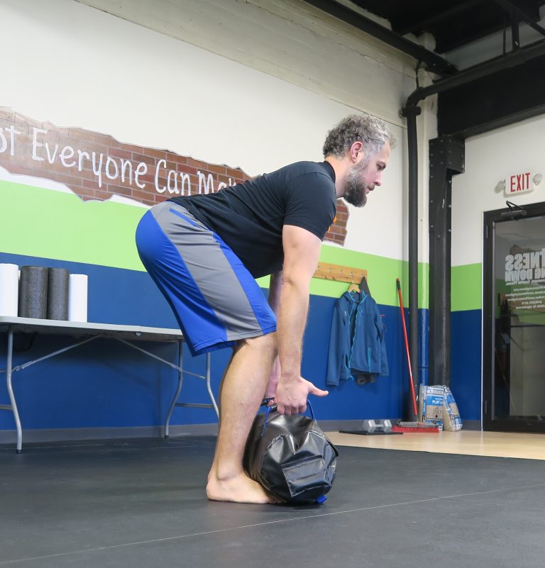 Get A Iron Grip with Ultimate Sandbag Exercises Ultimate Sandbag Training