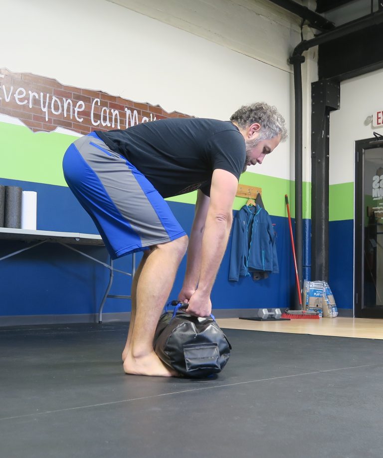 Get A Iron Grip with Ultimate Sandbag Exercises Ultimate Sandbag Training